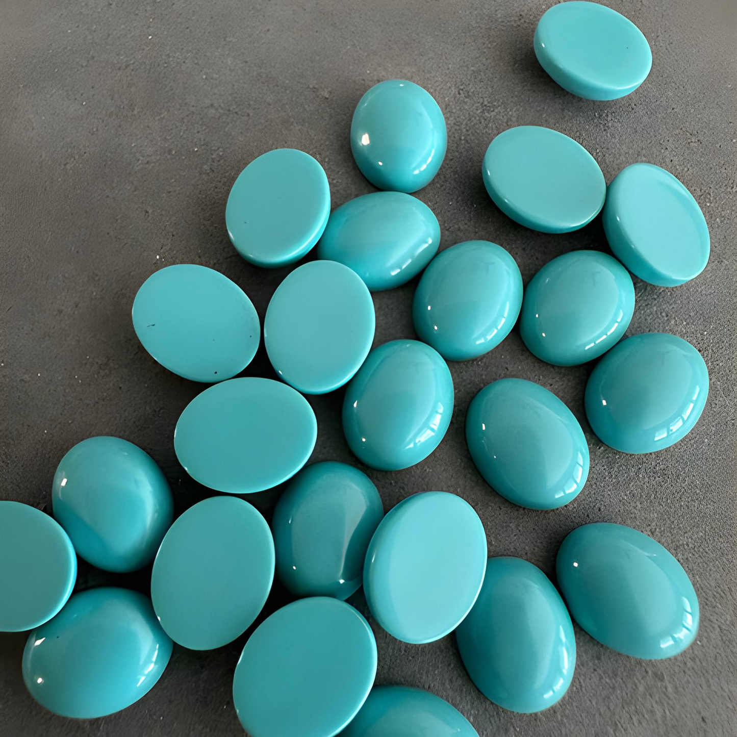 Oval cabochon synthetic turquoise loose gemstone