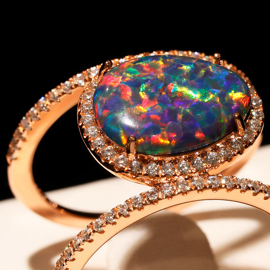 Black opal and diamond ring in rose gold