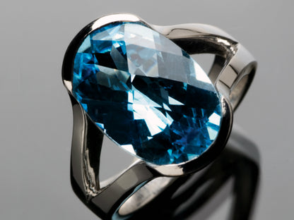 Oval cushion swiss blue topaz ring