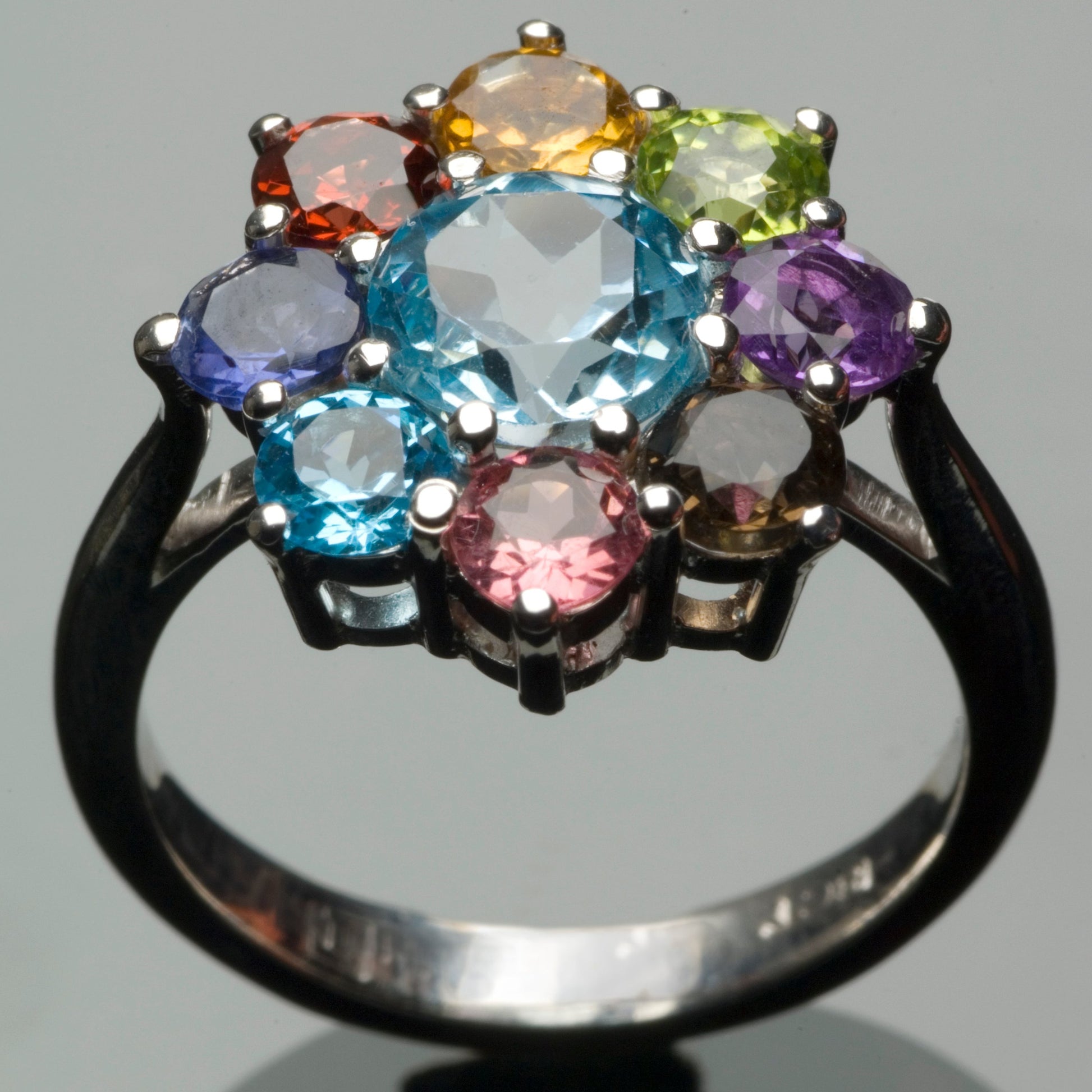 Blue, pink, yellow, green, purple,indigo, orange and brown tourmaline dress ring